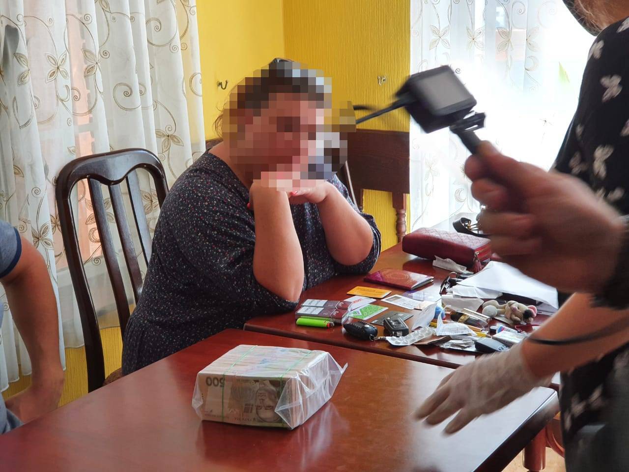 Судитимуть особу, яка вимагала 4 млн грн за вплив на службовців Антимонопольного комітету для зменшення штрафу (ФОТО)