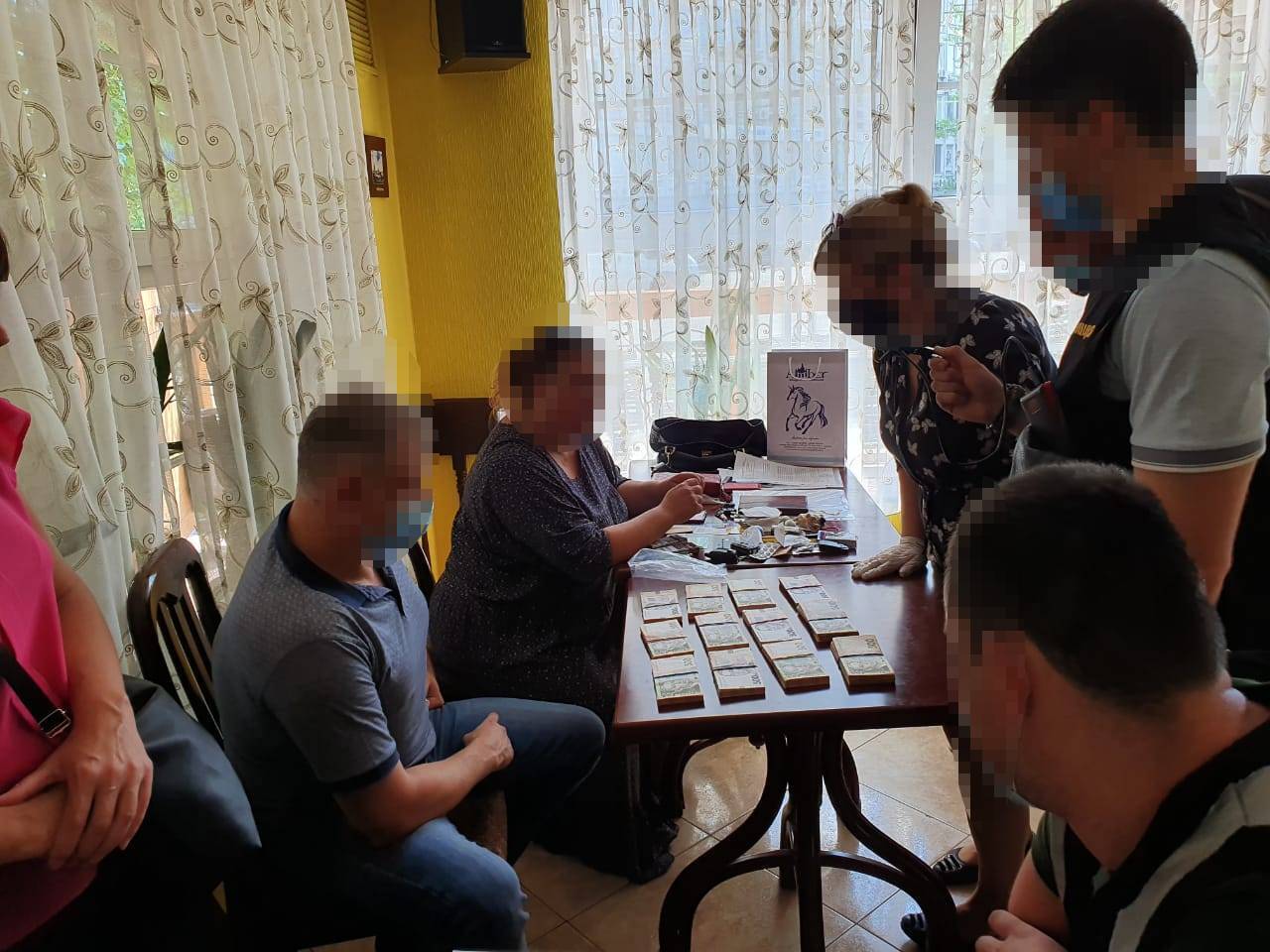 Судитимуть особу, яка вимагала 4 млн грн за вплив на службовців Антимонопольного комітету для зменшення штрафу (ФОТО)