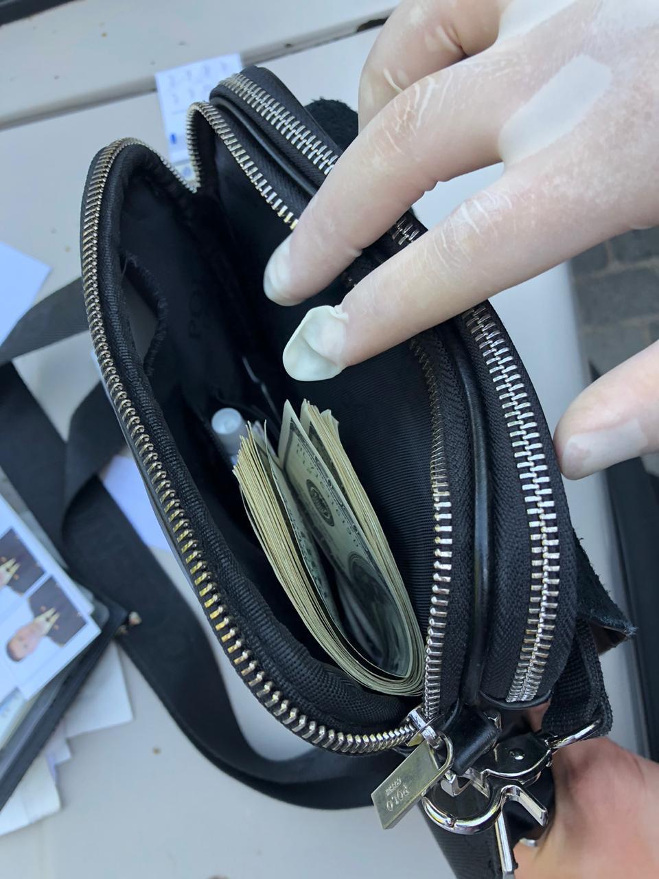 На хабарі в 2 тис доларів США та 10 тонн зерна викрито працівника СБУ (ФОТО)