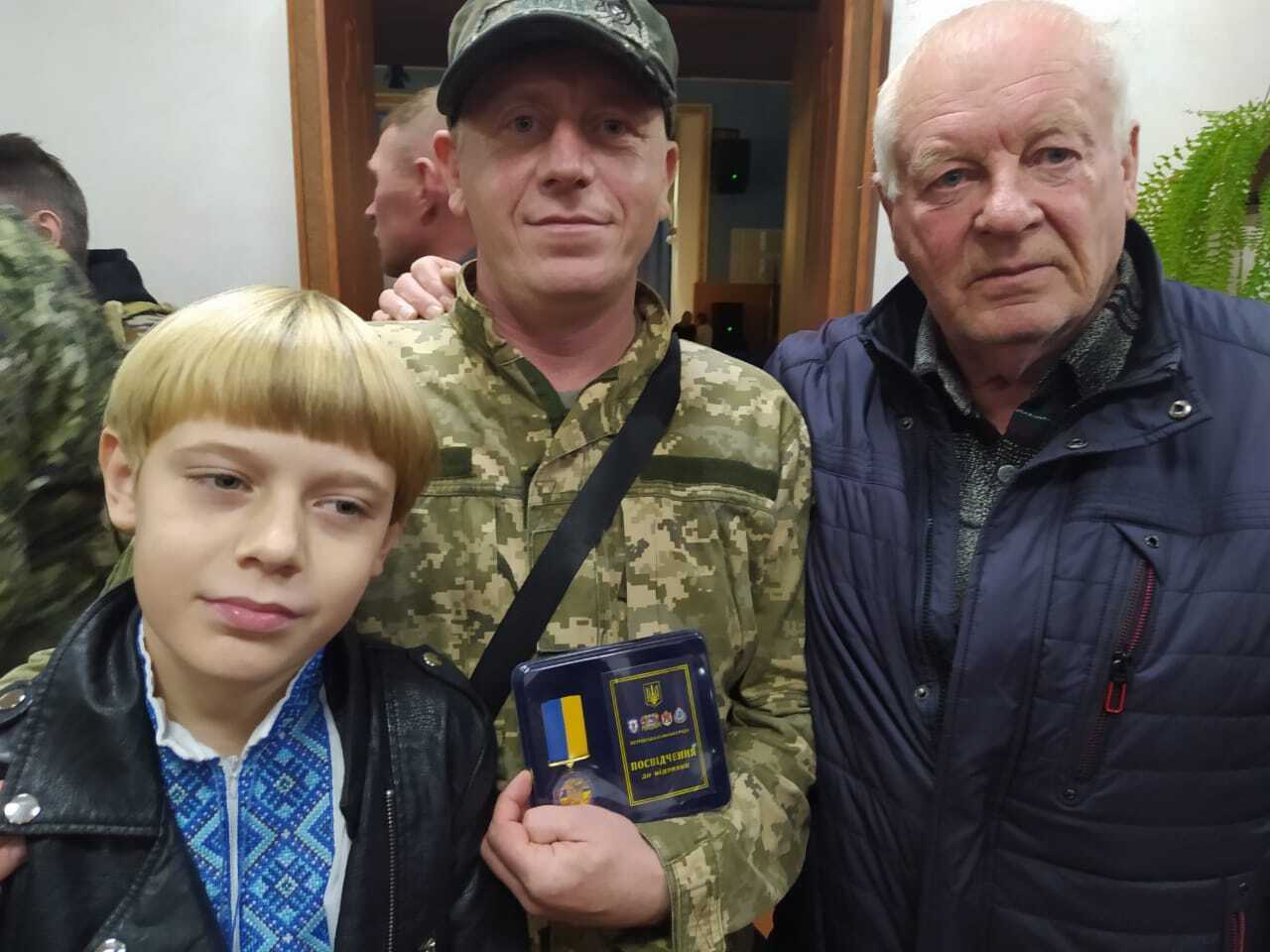 Дмитрий Воронков с отцом и сыном