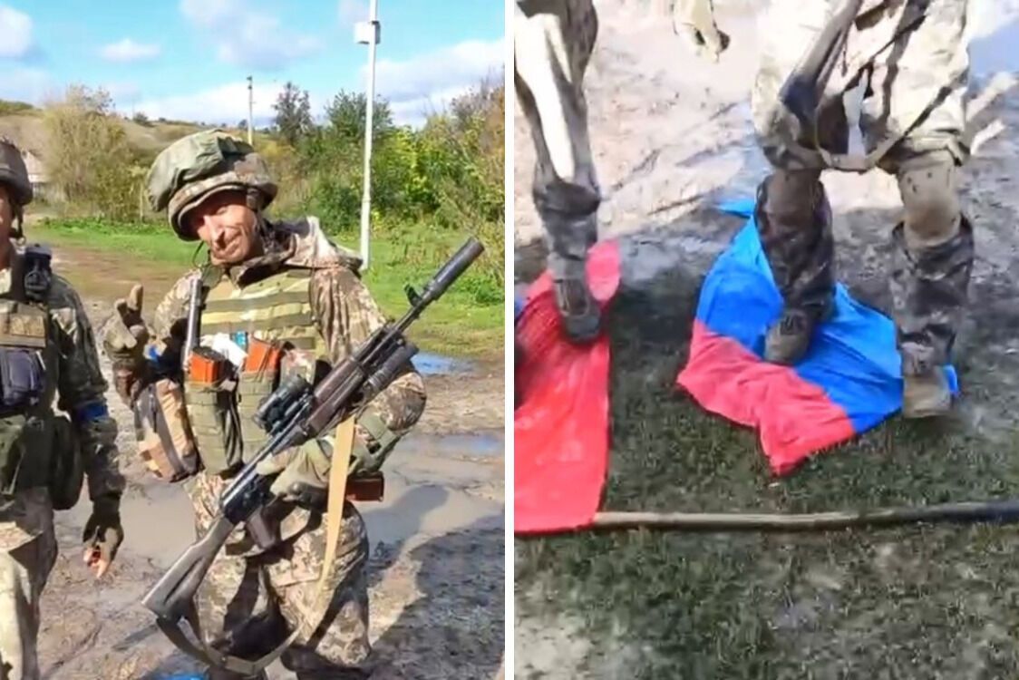 Украинский военный уничтожает флаг рф