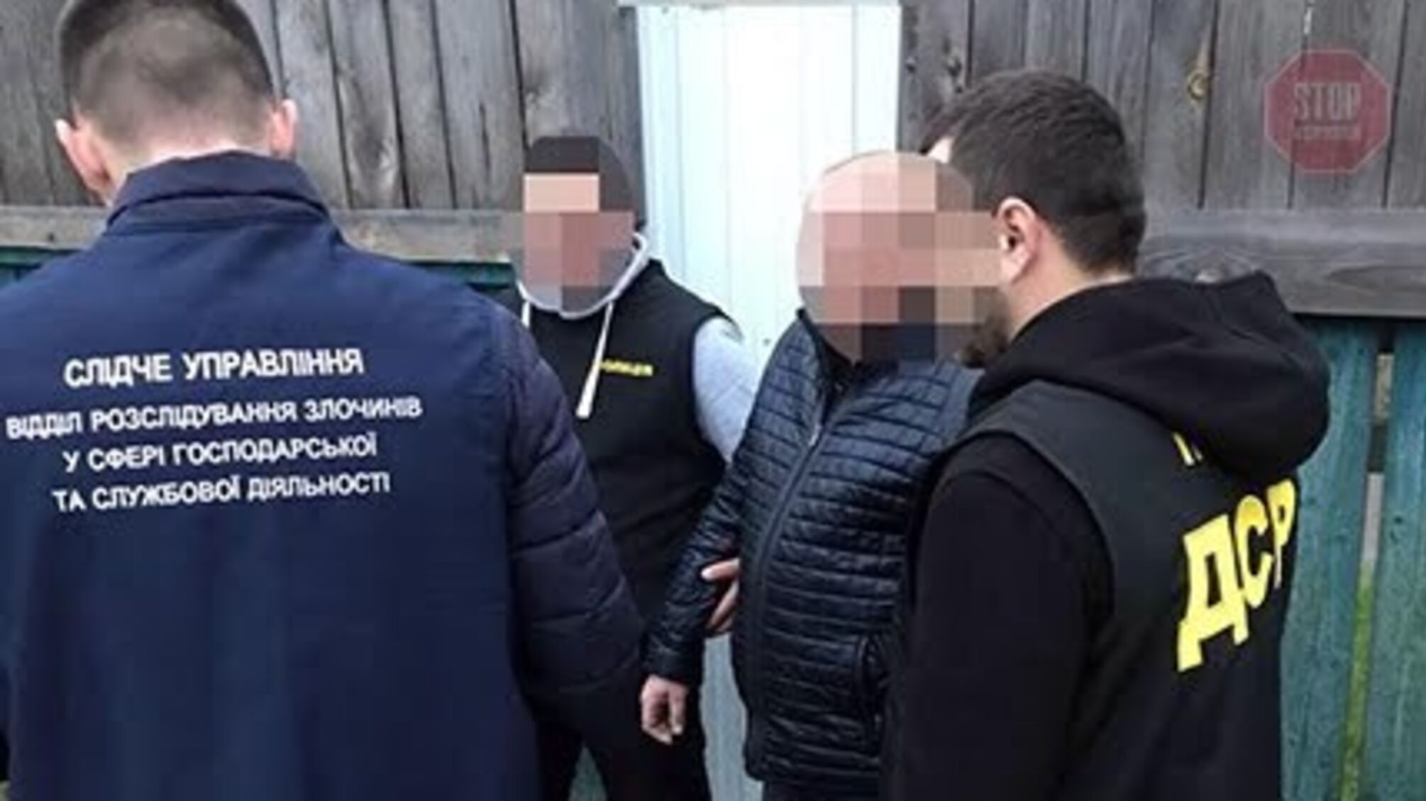 У Києві державного службовця викрили на доларовому хабарі (фото)