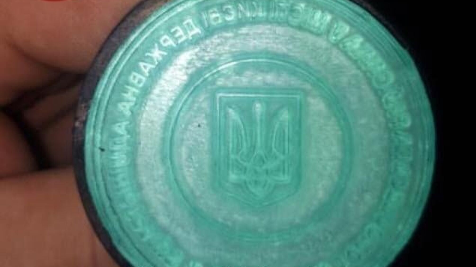 Навіщо китайцю печатки однієї з райадміністрацій столиці - подробиці затримання (фото)