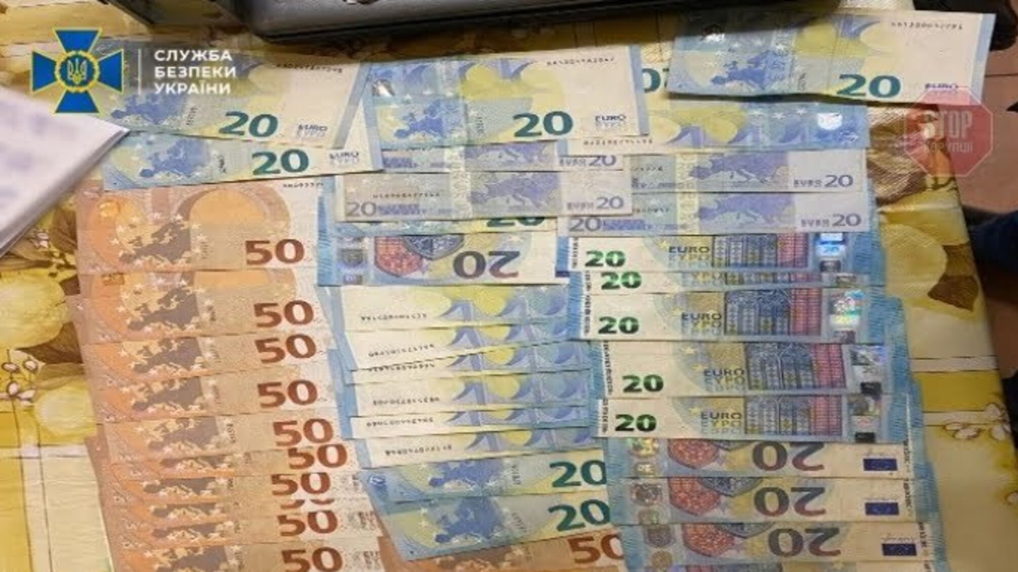 Збували десятки мільйонів фальшивих грошей: на Київщині СБУ викрила злочинне угрупування (фото)