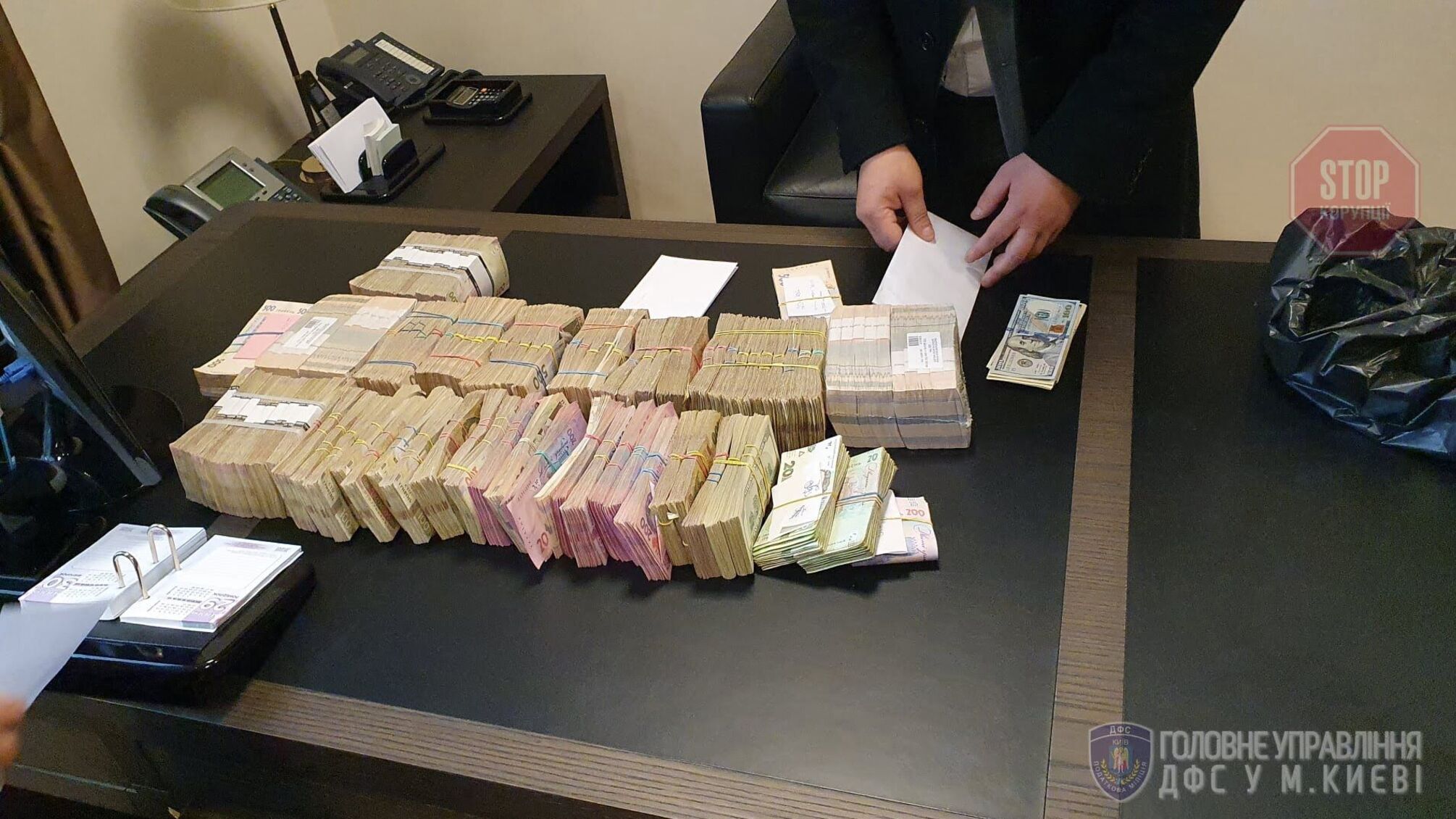 ГФС поймала по откате размером почти 19 миллионов гривен компаниию-члена «Великого строительства» (фото)