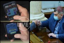 Во время выступления Шмыгаля в Раде народный депутат Корявченков побил рекорды в мобильной игре (фото)