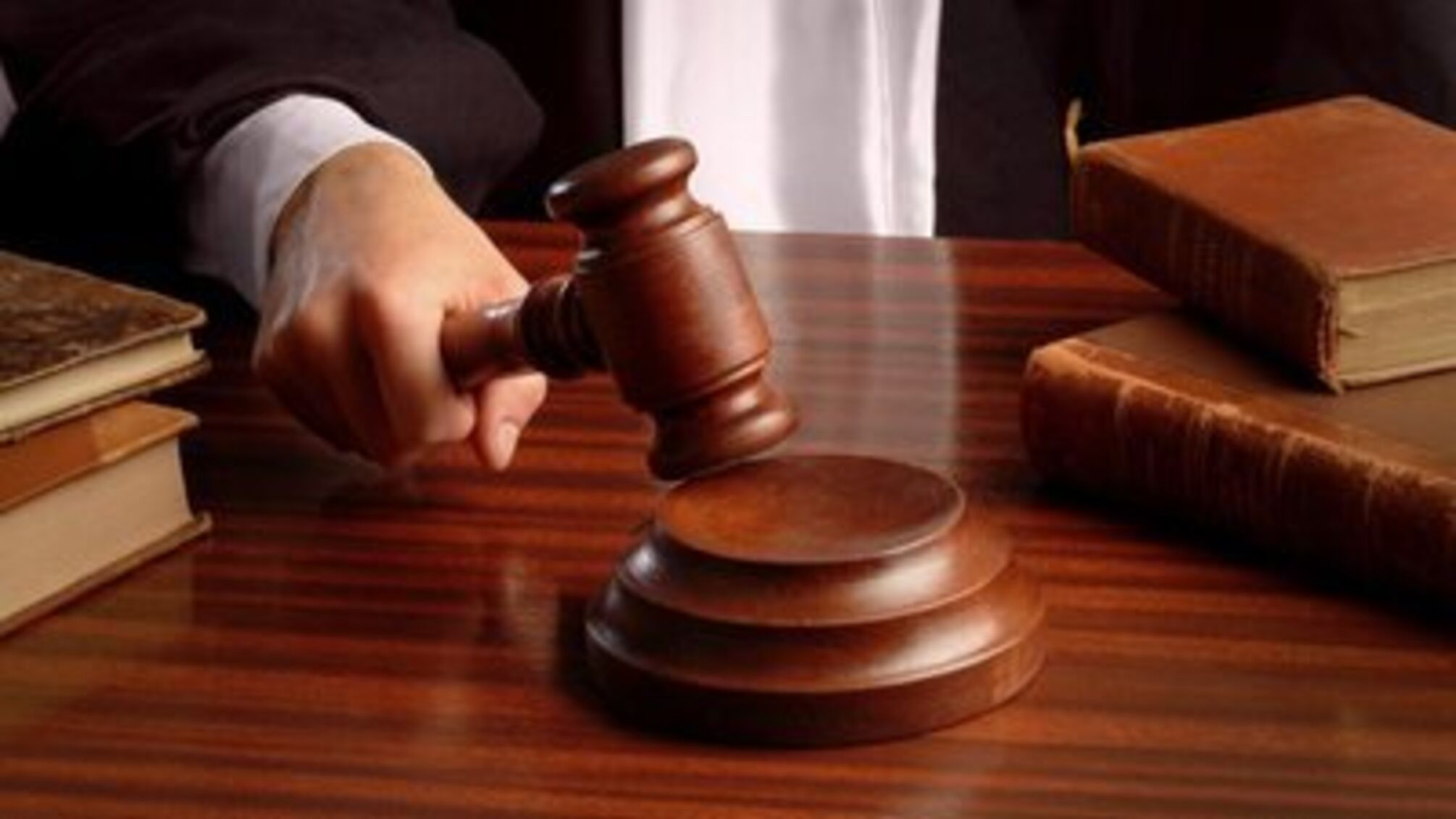 Суд вынес приговоры коллаборантам: 11 лет для харьковчанки и 5 для полицейского из Николаевской области