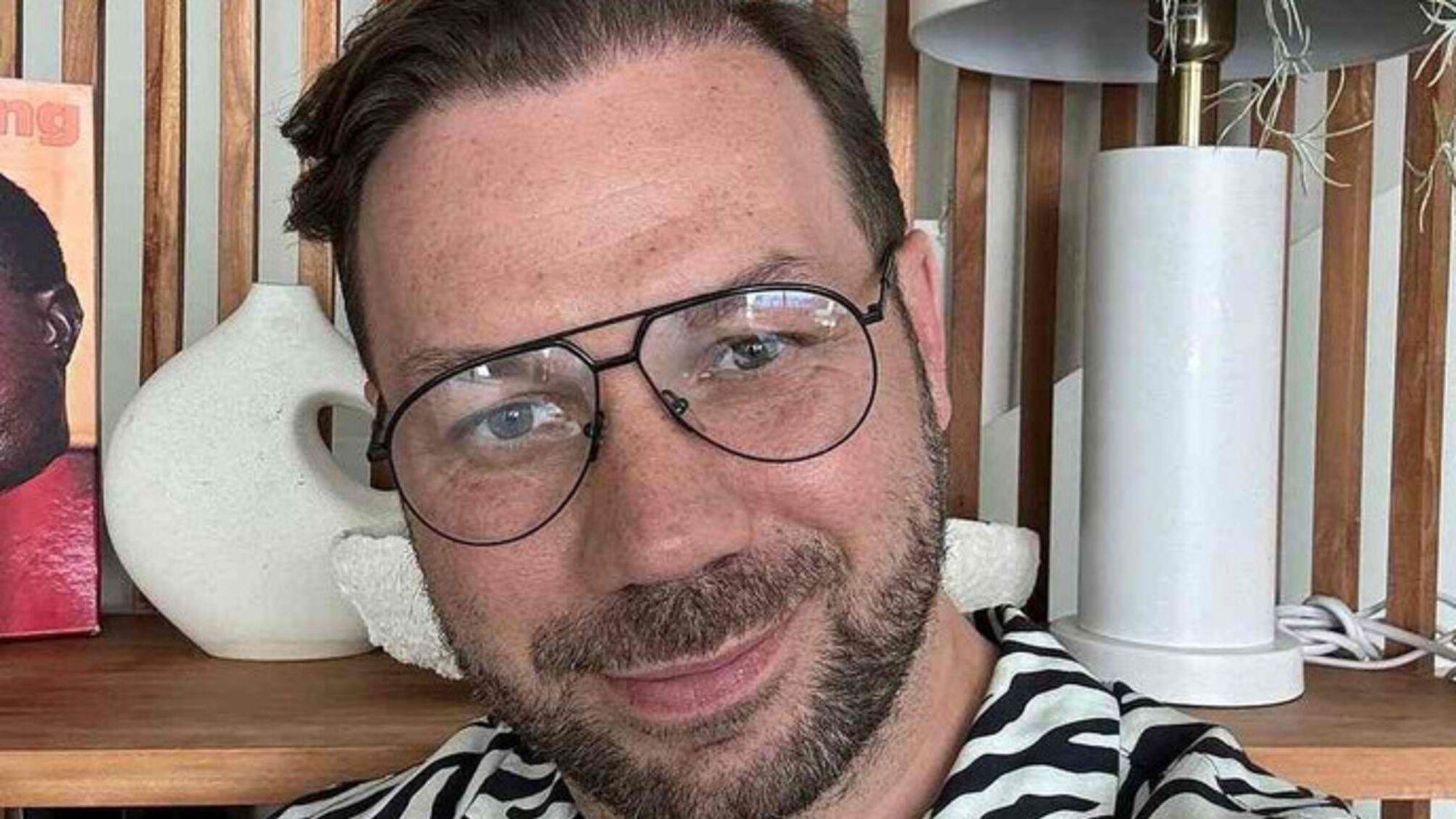 Андре Тан в очках