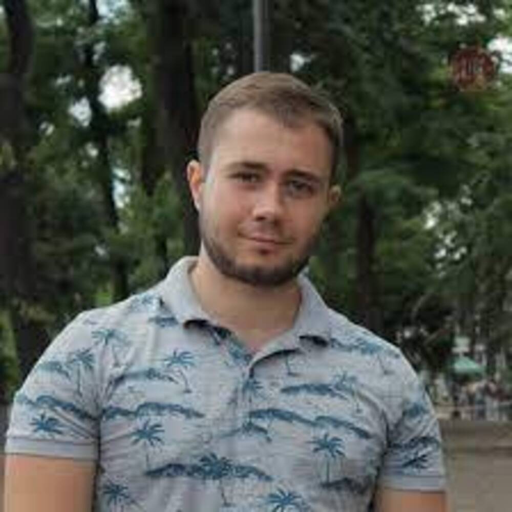 Максим Томилов